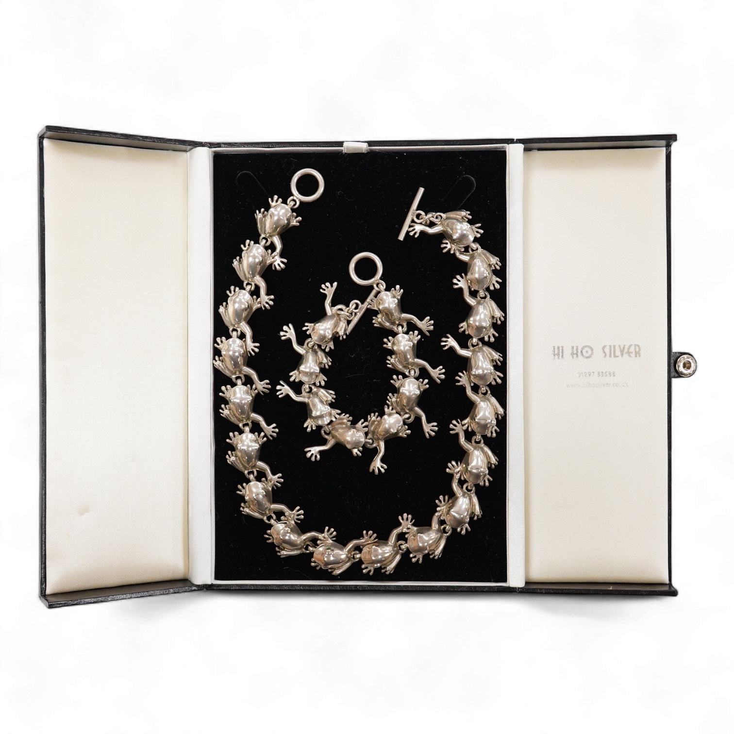 A recent white metal frog necklace, overall length 42cm and matching bracelet, 19cm, both stamped 925, gross 153 grams.